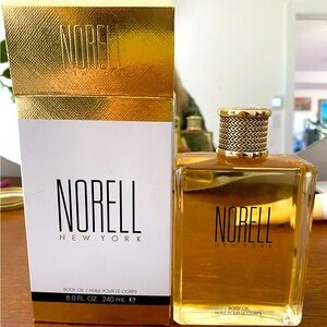 Unused still in box Norell New York body oil, 8 oz.